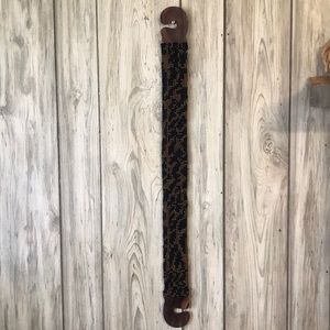 Stretch beaded belts. Wooden buckle. No name.